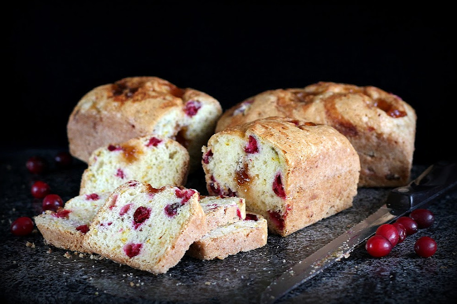 Add a moist and delicious frosted apricot cranberry bread to your Thanksgiving dinner menu. Pieces of tart cranberries and swirls of sweet apricot preserves combine to make a lovely holiday bread. Makes 1 standard loaf of three mini loaves.