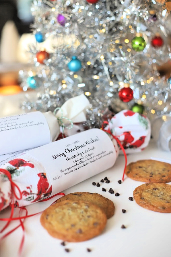 Make delicious holiday gifts from your kitchen. Easy recipe for chocolate chip cookie dough in festive packaging is frozen and ready to slice and bake for homemade cookies without the work. Perfect for teachers, neighbors and coworkers. 