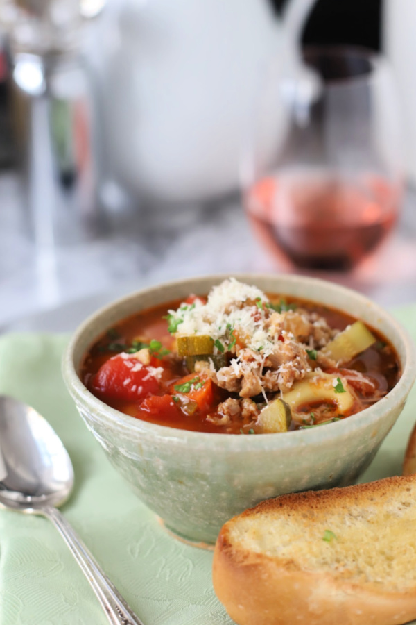 Italian sausage tortellini soup is a meal in a bowl. Hearty and so flavorful, this easy recipe is special for entertaining or perfect for a weeknight dinner with crusty bread. Lots of tender veggies and pasta in tomato broth topped with parmesan will warm your soul and tummy