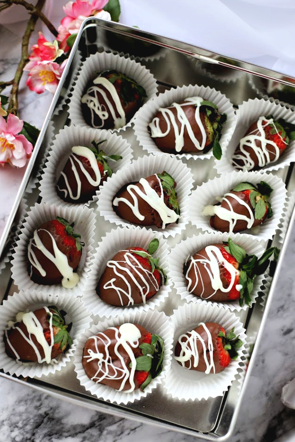 Romantic and perfect Valentine's Day edible gift for your sweetheart, chocolate dipped strawberries are easy with how-to recipe using the microwave.