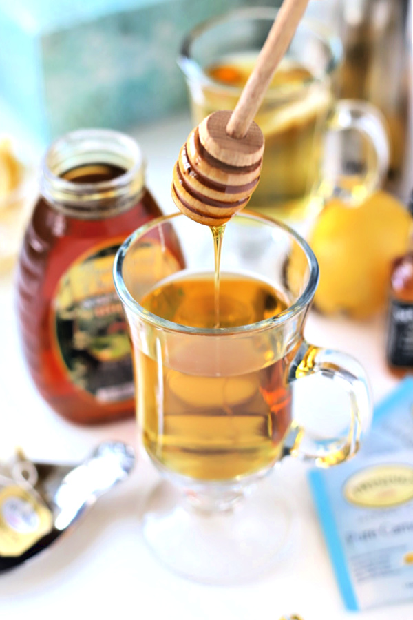 Make a very easy recipe for Hot Toddy when a cold or the flu has you down. It is warm and tasty with whiskey, tea, honey and lemon to help relieve symptoms so you can rest and feel better.
