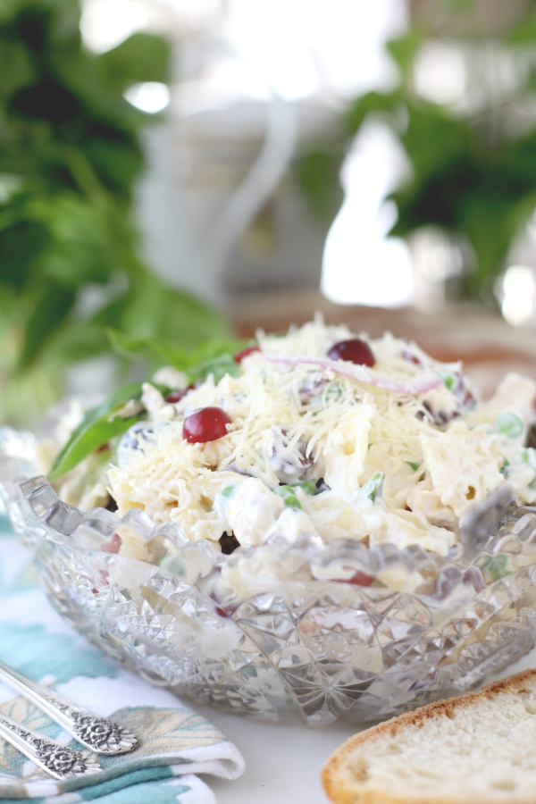 Chunks of chicken, bow tie pasta, Parmesan cheese, grapes and veggies are tossed together and then refrigerated a few hours for all of the flavors to blend and meld together. With a hint of lemon for brightness and, my personal favorite, basil, it is a bowlful of creamy deliciousness. 