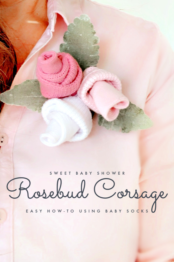 Sweet rose baby sock corsage is a lovely idea for the Mom-to-Be at her baby shower. Easy DIY rosebud how-to posy.