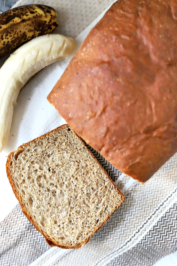 Easy recipe for healthy whole wheat bread with banana and honey. Use a bread machine for dough then shape and bake for a delicious, lightly sweet yeast bread. Slices well for sandwiches and perfect toasted!