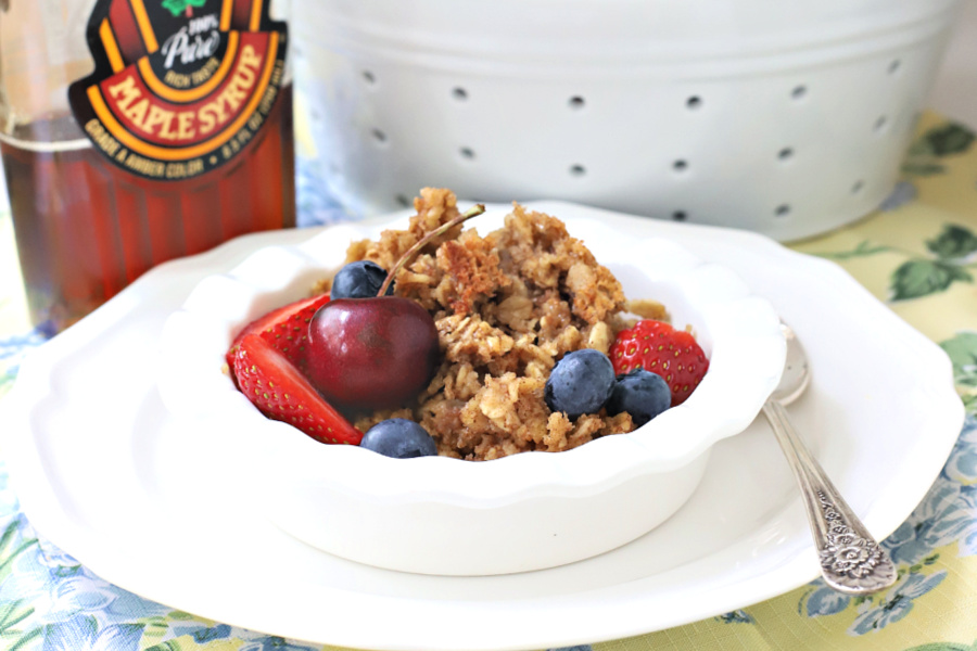 Baked oatmeal is an easy recipe and delicious for breakfast, brunch or snacking. This lightened version reduces the butter by substituting applesauce for a lightened, healthy oatmeal. Serve with milk, cream, maple syrup and fruit or as a topping for yogurt.