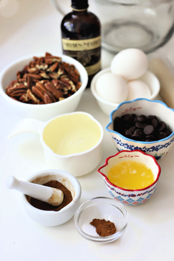Ingredients for making a chocolate pecan pie