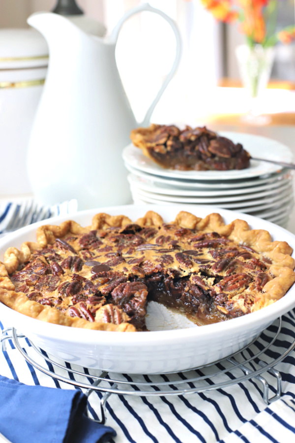 Easy recipe for chocolate pecan pie made with dark chocolate morsels and espresso powder for a decadent dessert.