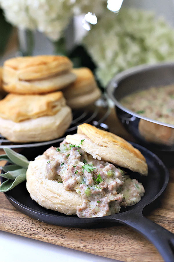 Easy recipe for old fashioned country sausage gravy served with flaky biscuits is delicious for a special weekend breakfast or even dinner.