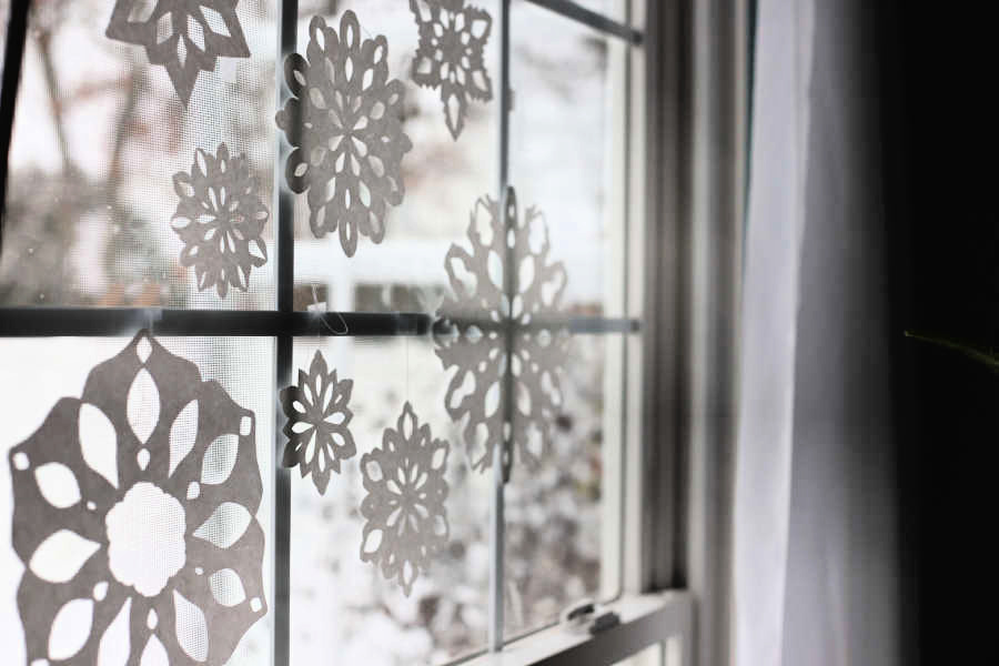 Simple how-to for paper snowflakes. Fun and easy craft for kids. Great winter project using scissors. Decorative for classroom and home.