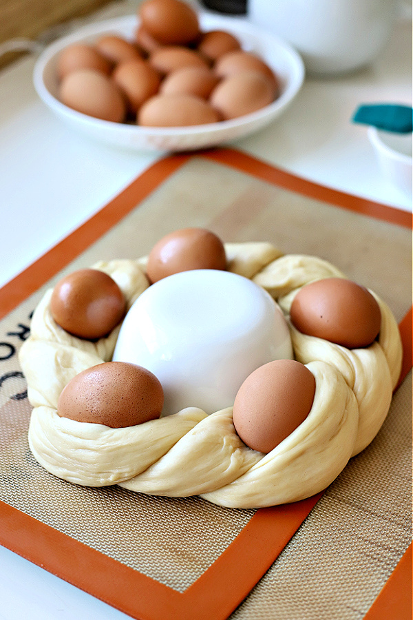 Adding the eggs to make a yeast Easter bread