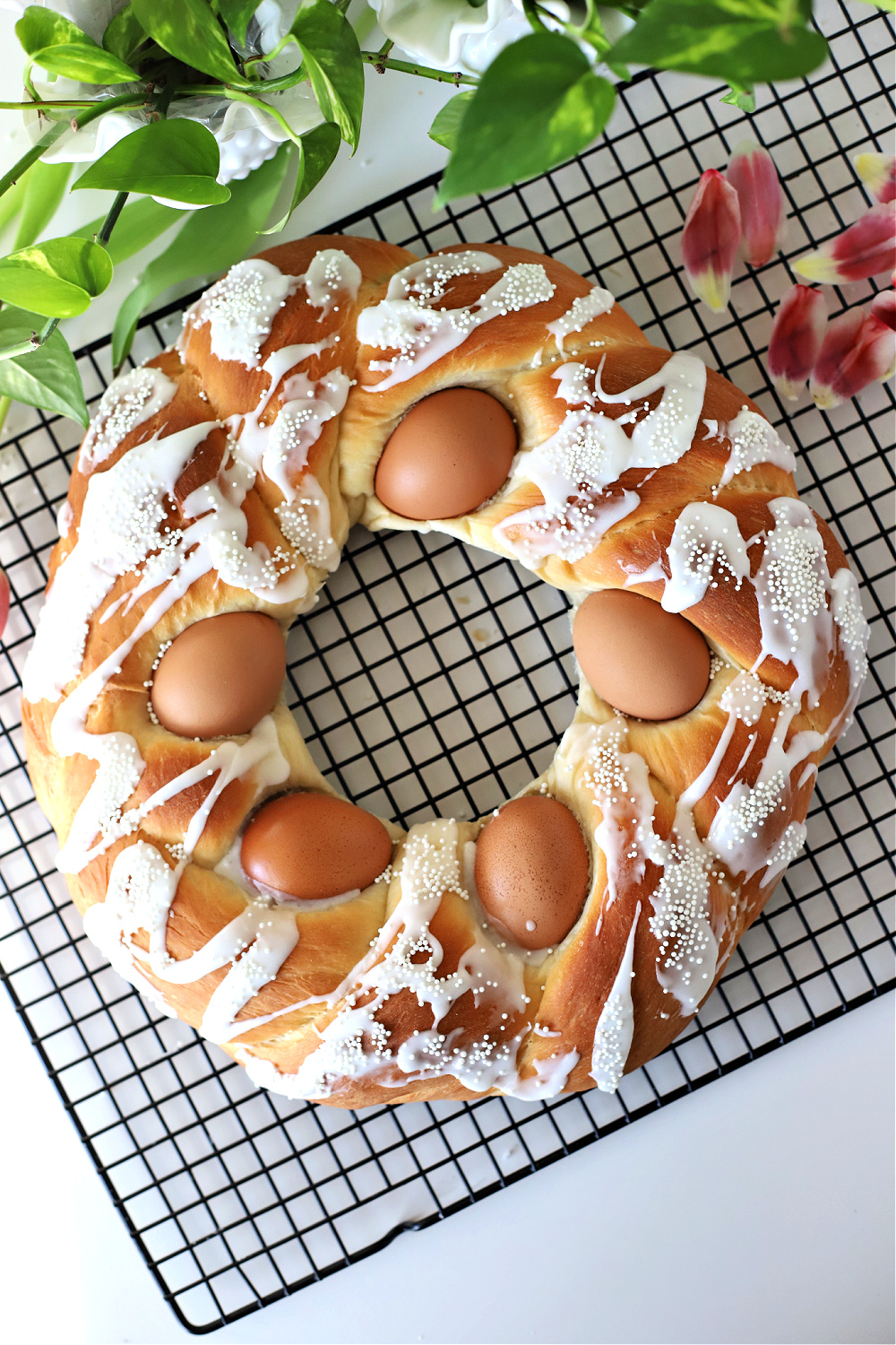 Using natural or dyed eggs you can make a beautiful sweet Easter bread. It is so easy especially when you let a bread machine do most of the work making the dough. An easy recipe for a lovely holiday breakfast.