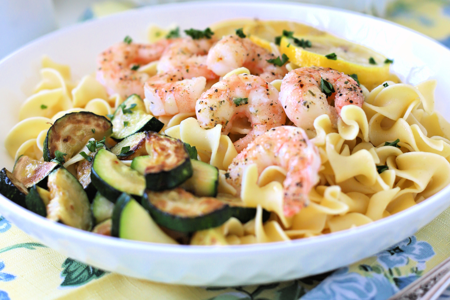 Serve this amazing one pan lemon shrimp over noodles or rice for a meal sure to impress. It couldn't be tastier or easier to make. A quick and easy recipe using butter and Italian Seasoning Mix and baked in the oven.