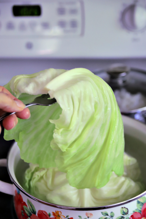 Separating cabbage leaves from boiling water