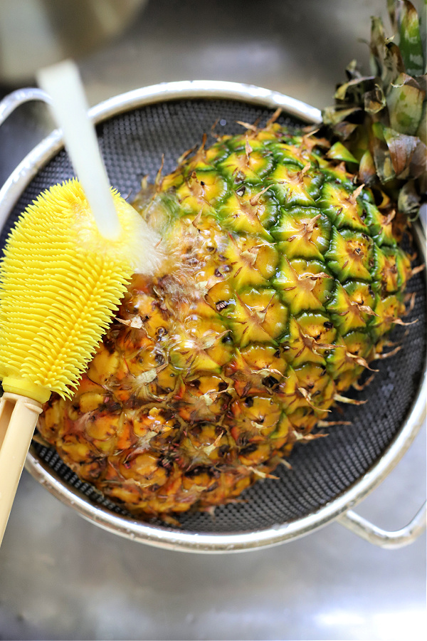 washing a pineapple prior to cutting