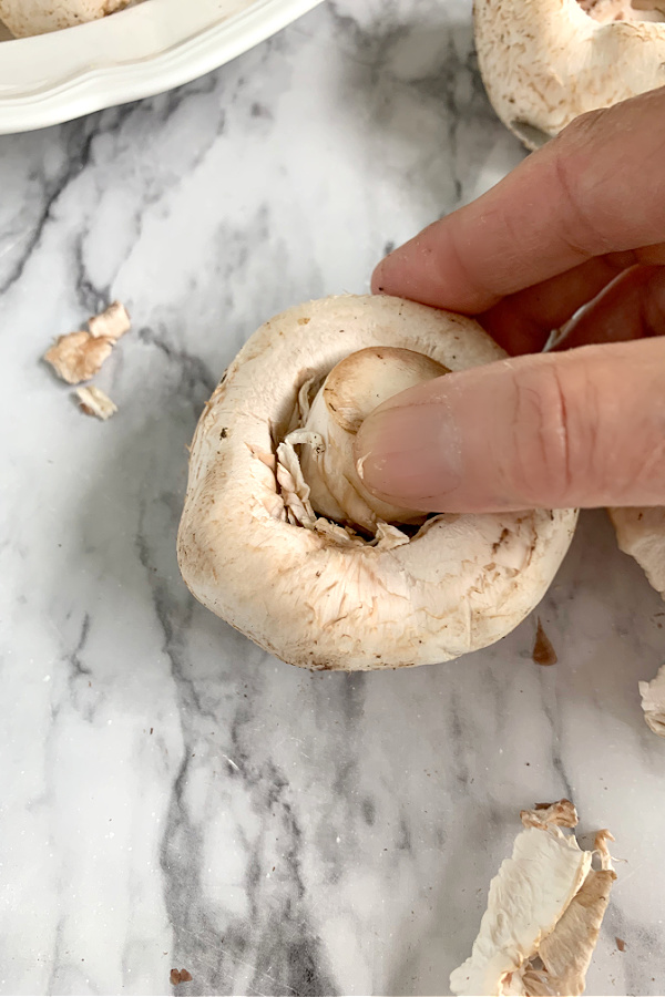 removing mushroom stems for sausage stuffed mushrooms