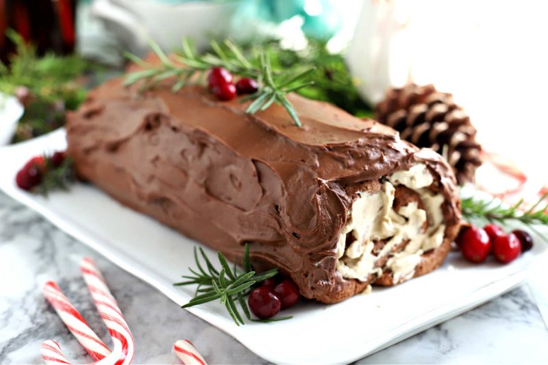 Visually beautiful, festive and delicious, Christmas yule log, filled with a mocha filling and chocolate frosting is a very special cake!