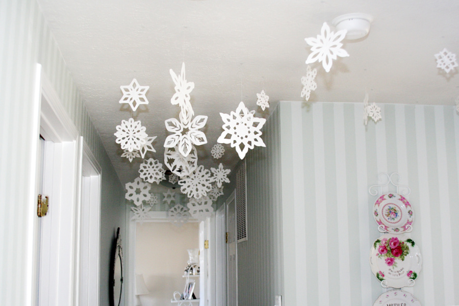 Winter decorating by hanging paper stars to delight kids.