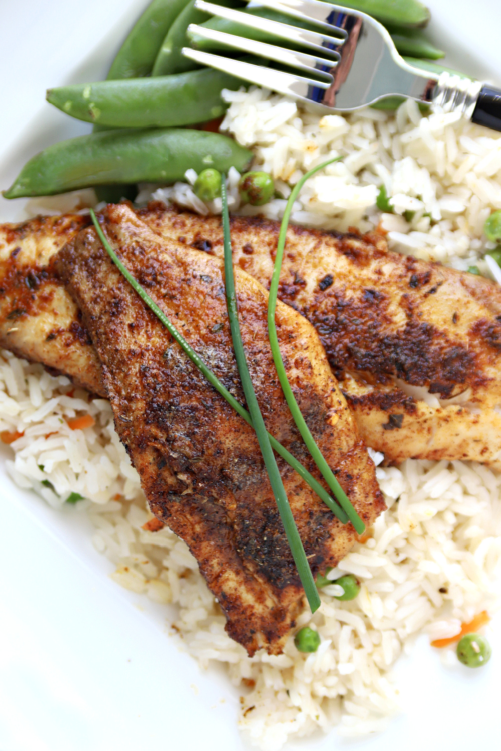 An easy recipe for how to make nutritious fish blackened tilapia cooked in an iron skillet, grill pan or baked with a spice and herb rub. 