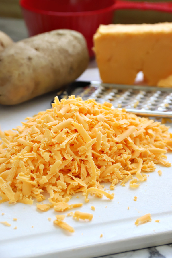 Grated cheddar cheese for shrimp and corn chowder