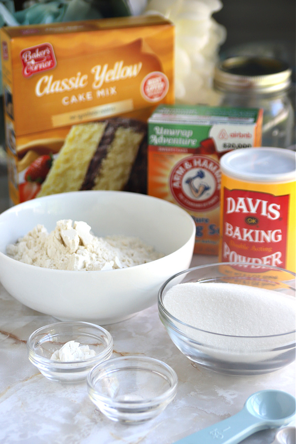 Flour and ingredients for how to make upsize cake mix for 18.25 ounce extender size.