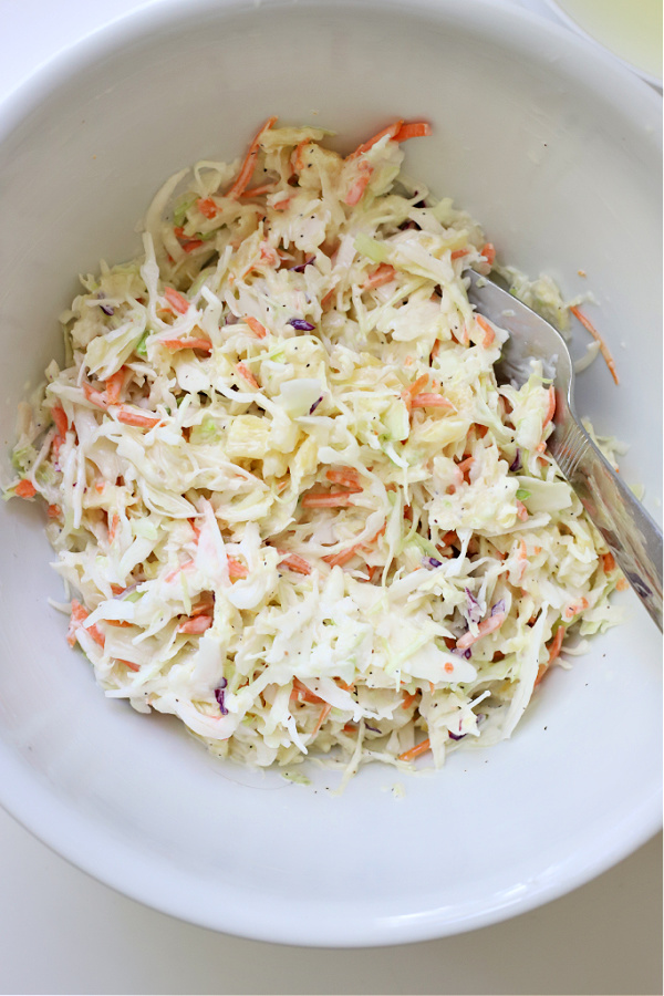 How to make pineapple coleslaw. A super easy recipe with a Hawaiian flair great with pulled pork or burgers.