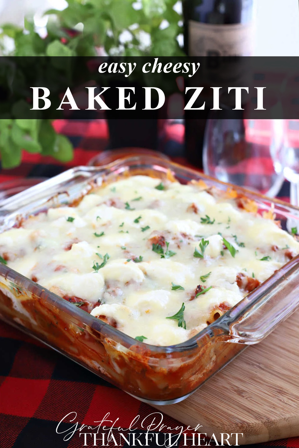 Cheesy baked ziti, a classis pasta casserole, with sausage or ground beef, tomato sauce, ricotta, mozzarella and parmesan is an easy recipe.